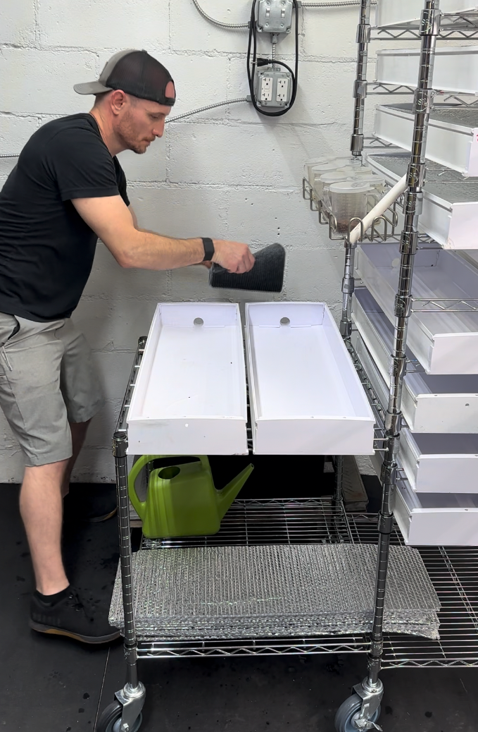 Transferring soaked mat into grow channel